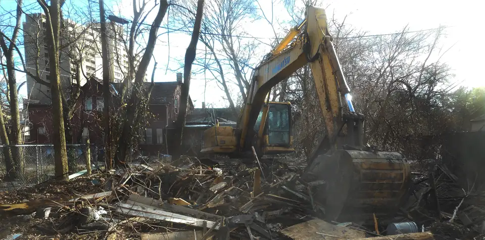 Carey Demolition cleaning up debris after a home demolition in Cleveland Ohio